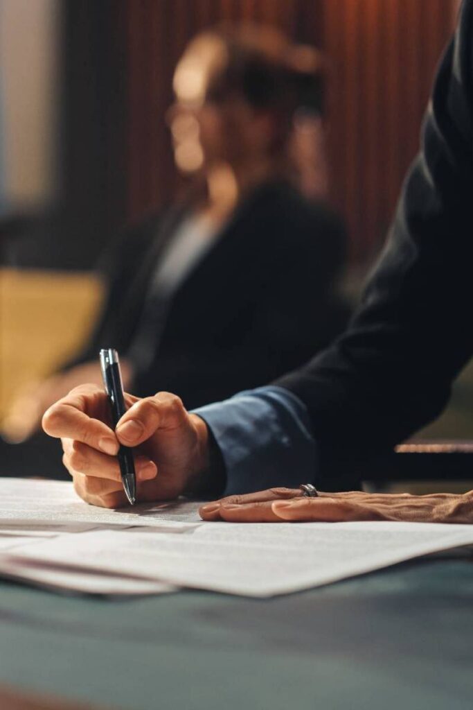 Attorney writing legal notes