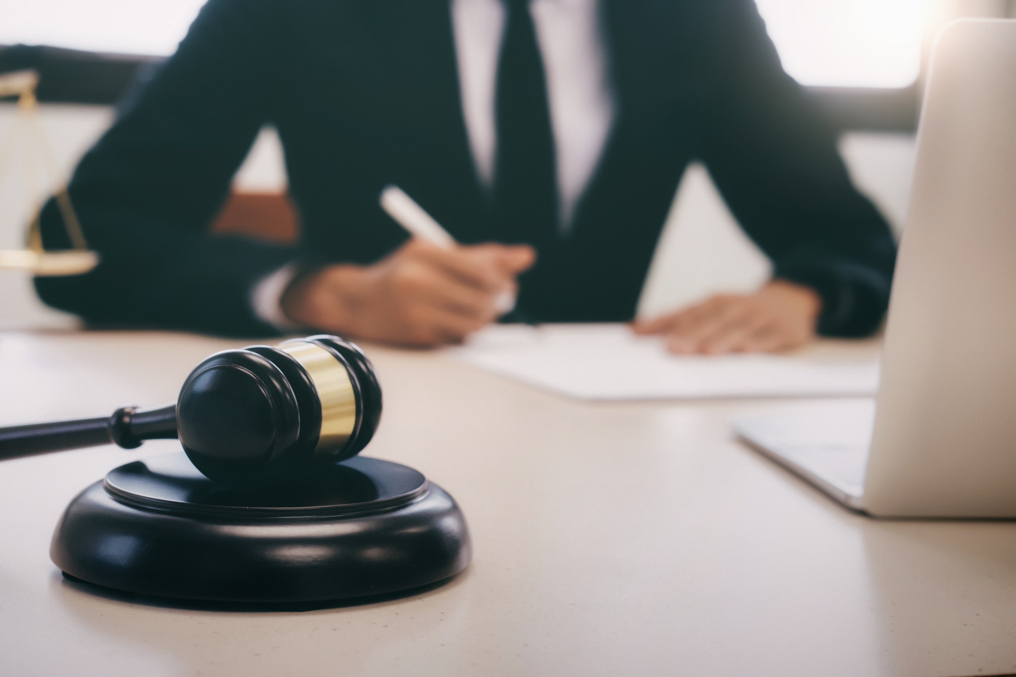 Gavel on desk for legal cases.