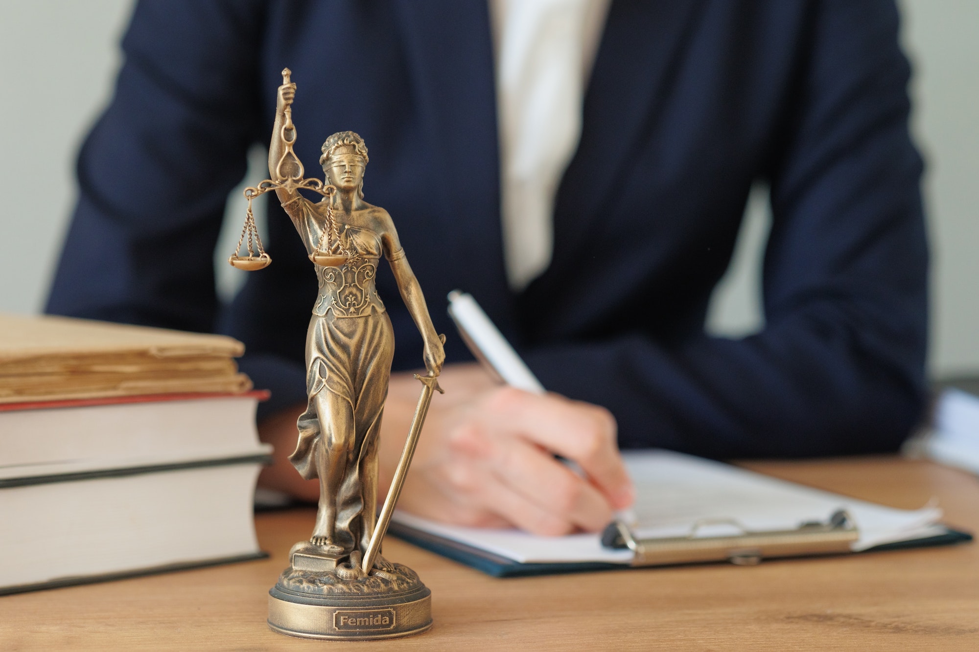 Attorney writing legal notes